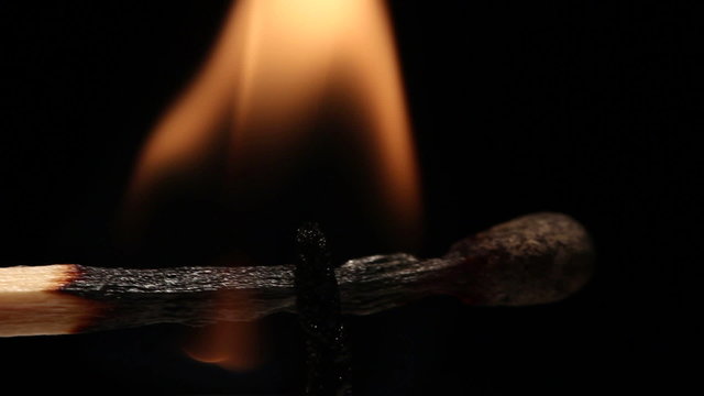 Match and candle. Fire, macro