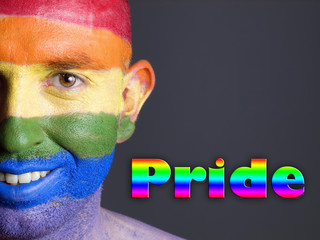 Gay flag face man smiling and pride concept