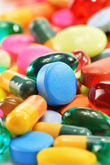 Composition with dietary supplement capsules and drug pills