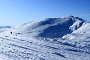 Winter hiking in snowshoes.