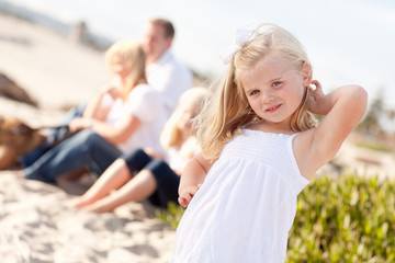 Obraz premium Adorable Little Blonde Girl Having Fun At the Beach