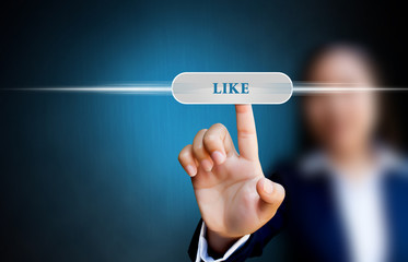 hand of business women pushing a button on a touch screen interf