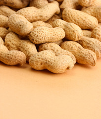 tasty peanuts, on beige background