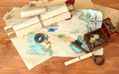 map of treasures on wooden background