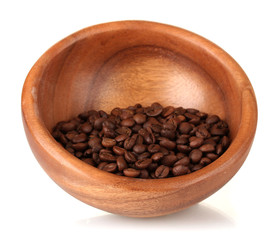 Coffee beans in wooden bowl isolated on white