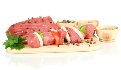 Raw beef meat marinated with herbs and spices isolated on white