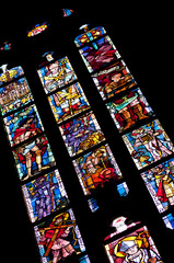 Medievel stories on the colorful glass inside duomo cathedral