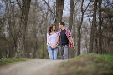 Fototapeta premium Teenagers Walking Along Alley