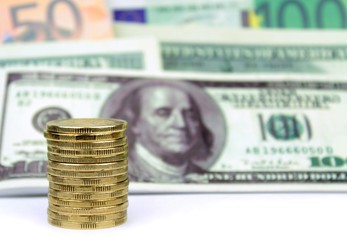 Coins, euro and dollar banknotes and coins, money background