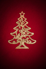 Naklejka na ściany i meble christmas golden tree on red