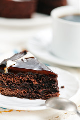 Chocolate cake and cup of coffee