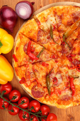 Tasty pepperoni pizza with vegetables