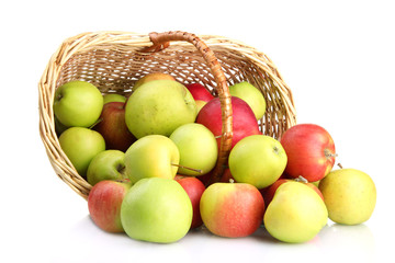 juicy apples in basket, isolated on white