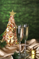 beautiful christmas tree and  glasses of champagne