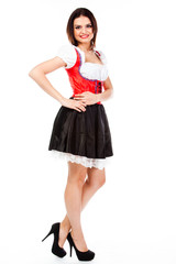 young and beautiful woman in a traditional Bavarian dress