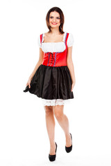 Naklejka premium young and beautiful woman in a traditional Bavarian dress