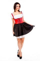 Naklejka premium young and beautiful woman in a traditional Bavarian dress