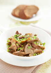 mushrooms, ready to eat in a white plate
