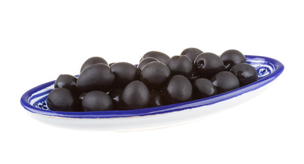 Olives black watered with olive oil in a bowl isolated on a whit