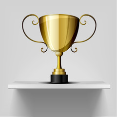 gold trophy on a shelf
