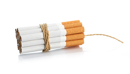 Cigarettes tied with rope and wick isolated on white