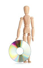 Wooden doll carries data storage media, CD or DVD