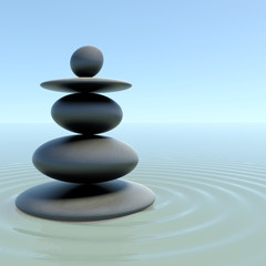 Zen stones on calm water