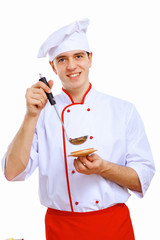 Young cook preparing food