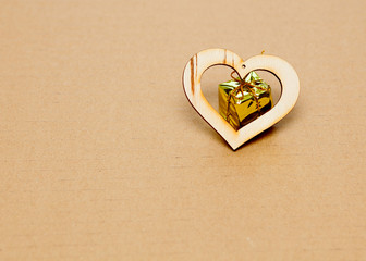 small present in a wooden  heart