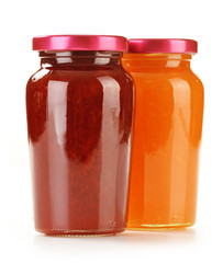 Two jars of fruity jams isolated on white. Preserved fruits