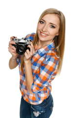 High angle view of smiling casual female with camera