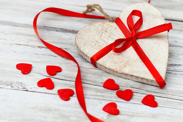 wooden background with red heart