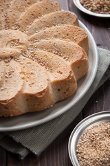 Fototapeta premium Rustic bread with sesame seeds