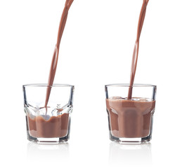 Filling glass of chocolate milkshake