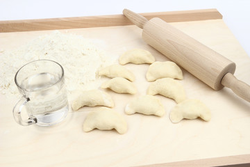 Dumplings on a pastry board