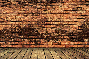 Brick wall with wooden walk way