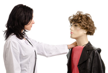 Woman doctor with a male mannequin