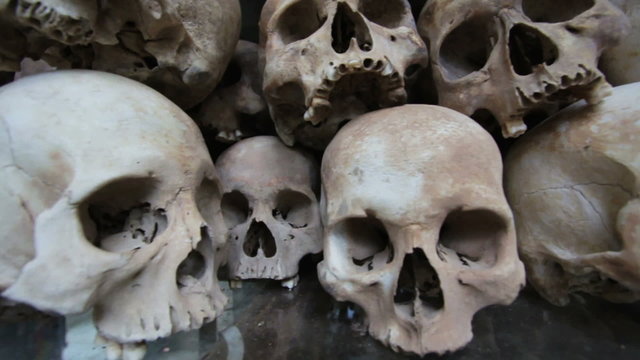 Skulls and bones in Killing field, cambodia, moving camera