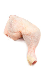 raw chicken legs on a white background.  Fresh raw turkey leg is