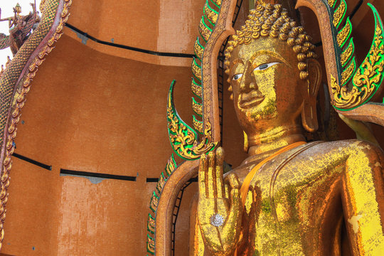 Big golden Buddha in temple of thailand
