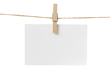 blank white paper card hanging