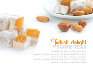 Turkish delight (lokum) with nuts on white background