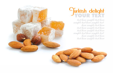 Turkish delight (lokum) with nuts on white background