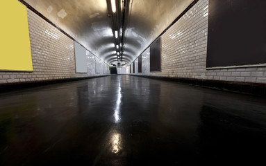 Old underground tunnel illuminated with neon