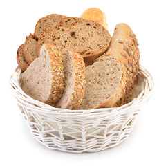 Assortment of bread in basket isolated