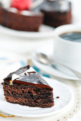 Chocolate cake and cup of coffee