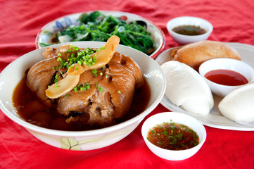 Traditional Chinese food Stewed pork leg and Chinese steamed bun