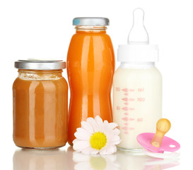 Baby food, bottle and juice isolated on white