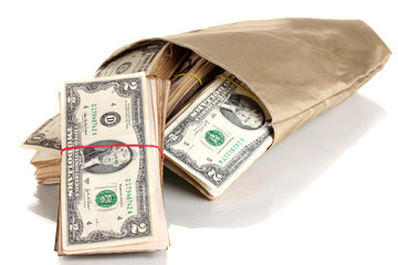 Bag with stacks of dollars isolated on white