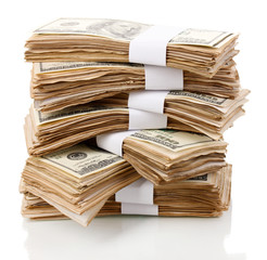 Naklejka premium Stack of one hundred dollars banknotes close-up isolated